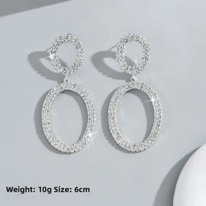 Sparkly silver double oval drop earrings with white rhinestones, size 6cm and weight 10g