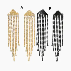 Elegante lange kwastjes oorbellen met strass in goud en zwart voor feestelijke looks