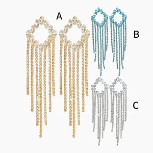Statement tassel drop earrings with sparkling rhinestones in gold, blue, and silver finishes