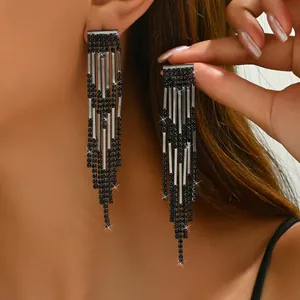 Elegant long black tassel drop earrings featuring shimmering crystals for party wear