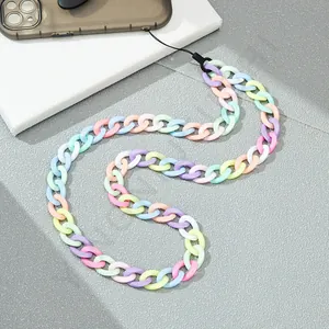 Macro view of long macaron acrylic chain link phone lanyard in vibrant candy colors