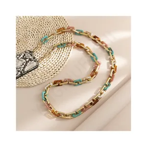 Long acrylic cell phone crossbody chain with colorful resin links and gold metal clasps