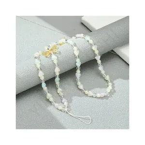 Pastel beaded phone strap with colorful heart beads and a yellow butterfly charm