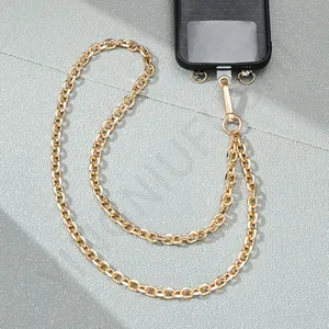 Detailed view of a gold metal phone chain with oval links and a secure spring clasp