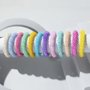 Colorful handmade glass bead phone charm set in 12 candy colors on white display stands
