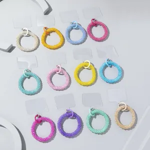Set of 12 colorful beaded phone charms with metal clips and clear plastic patches