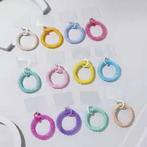 Colorful handmade glass bead phone straps in 12 candy colors with metal ring and clear tab