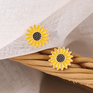 Vibrant sunflower stud earrings with yellow enamel petals and golden alloy frame