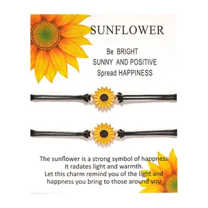 Handmade woven sunflower bracelets with adjustable black wax cord on a gift display card