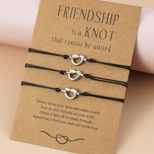 Set di 3 braccialetti con nodo in acciaio inossidabile su carta dell'amicizia