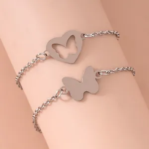 Minimalistische zilveren vlinder armbanden set voor dames met hart hanger