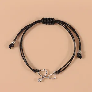 Bracciale infermiera con ciondolo stetoscopio cuore in argento e corda nera
