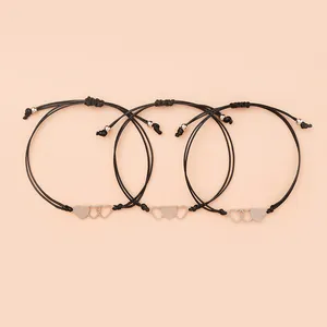 Set of 3 adjustable black cord bracelets with interlocking silver heart charms