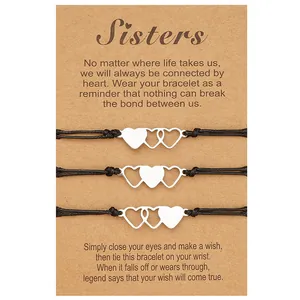 Set of three Sisters theme stainless steel heart woven bracelets on kraft wish card