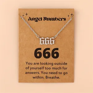 Collier pendentif chiffre des anges 666 argenté sur carte de présentation en kraft