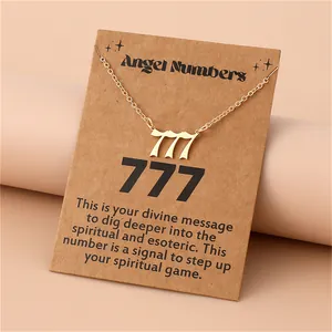 Gold stainless steel 777 angel number pendant necklace on kraft display card