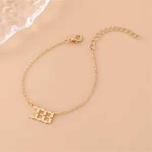 Gold stainless steel chain bracelet with gothic number 333 pendant for women