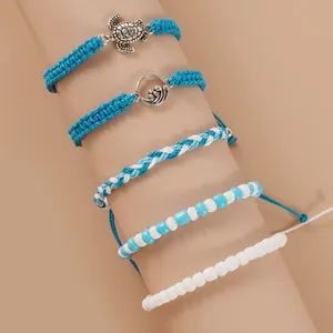 Ensemble de cinq bracelets de cheville bohème avec tortue marine et perles tissées