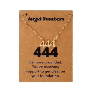 Golden stainless steel necklace featuring 444 angel number pendant on display card