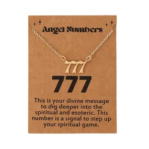 Golden 777 angel number necklace on a brown spiritual meaning display card