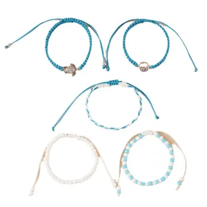 Set de 5 bracelets de cheville avec breloques tortue et vagues en cordon de cire tissé