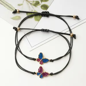 Braccialetti a farfalla fatti a mano con corda di cera intrecciata e ciondoli glitterati