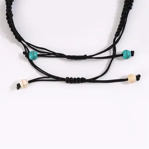 Bohemian turtle bracelet featuring black woven cord and turquoise turquoise beads