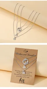 Three-piece stainless steel mother-daughter necklace set with engraved heart pendants