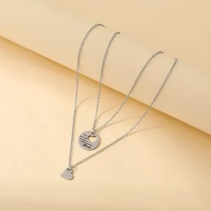 Three-layered stainless steel heart necklace set with engraved mom sentiment message