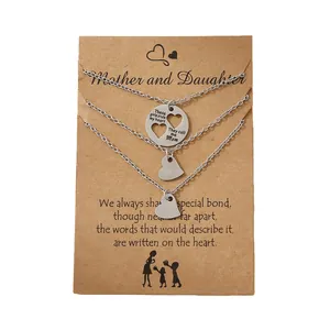 Three-piece stainless steel mother-daughter necklace set with heart cutout pendant