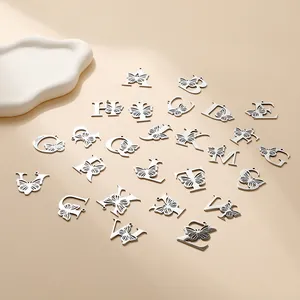 Stainless steel 26 English letter pendants with hollow butterfly design for DIY jewelry