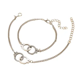Handcuff charm bracelets with PUT DOWN engraving and adjustable silver metal chains