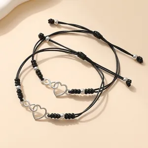Infinity-Herz gewebte Armbänder für Paare mit verstellbaren schwarzen Wachsseilen