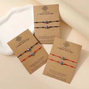 Gevlochten 7-knopen Evil Eye armbanden in rood en zwart met symbolische kaarten