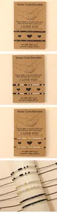 Detailed view of Morse code bracelets featuring beads on kraft paper I Love You cards