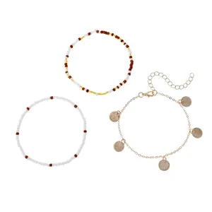 Bohemian multi-layer gold chain and bead bracelet set with stylish shell pendants