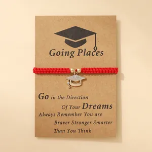Red braided graduation bracelet with sparkling gold mortarboard pendant on card