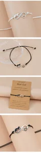 Detail of woven cat bracelet with infinity heart charm on inspirational kraft card