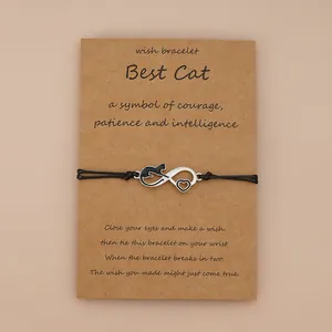 Handmade infinity cat wish bracelet with heart charm on kraft paper display card