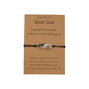Handmade infinity cat wish bracelet with adjustable black rope on gift display card