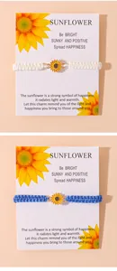 Detail of hand-woven sunflower bracelets in blue and white with illustrated display card