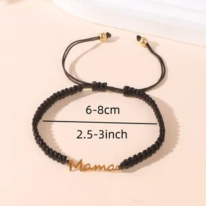 Bracelet Mama noir tissé ajustable avec lettrage en acier inoxydable doré