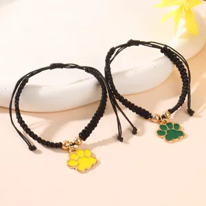 Bracelets réglables en corde tressée noire avec mignons pendentifs de pattes colorées