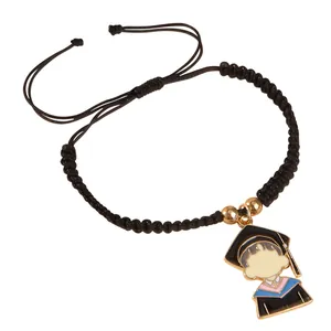 Handmade graduation cord bracelet with black academic cap charm and gold beads