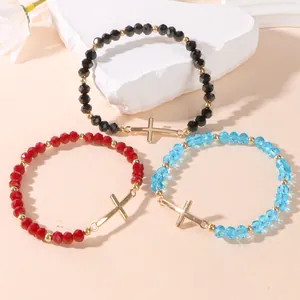 Cross crystal beaded elastic bracelets in black red and blue with gold pendants