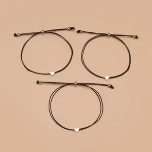Lot de trois bracelets en cordon noir réglable avec breloques cœur en argent poli