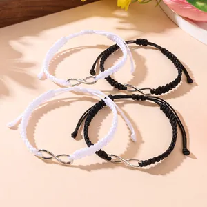 Ensemble de bracelets tressés avec symbole de l'infini pour couples noir et blanc réglables