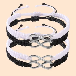 Ensemble de bracelets en corde tressée symbole infini noir et blanc avec nœuds réglables