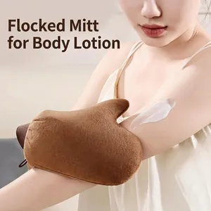 Soft brown flocking tanning mitt for body lotion application with thumb design