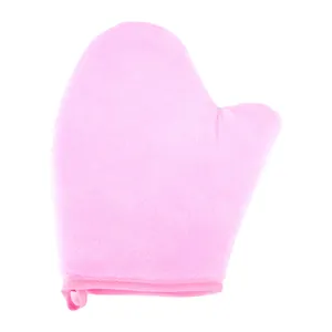 Soft pink velvet tanning mitt with thumb design and hanging loop for easy application